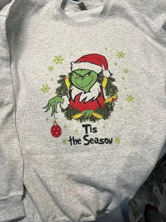 Grinch stuck in wreath